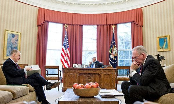 President Obama in the Oval Office with, on the left, Thomas E. Donilon, the national security adviser, and John O. Brennan, his top counterterrorism adviser. (Pete Souza/The White House)