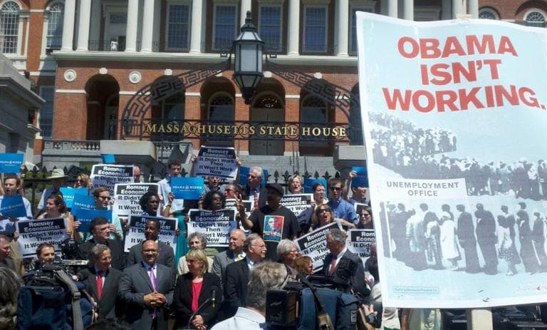 Obama and Romney supporters turn out for a State House news conference. (State House News Service, via Twitter)