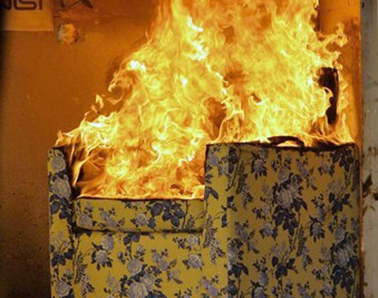 Government scientists found that chairs containing flame retardants, like the one being tested above, burn just as fast as identical chairs without them. (Consumer Products Safety Commission)