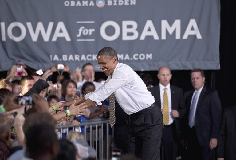 President Barack Obama greets supporters as he arrives at a campaign grassroots event at the Iowa state fairgrounds, in Des Moines, Iowa, Thursday, May 24, 2012. (AP)