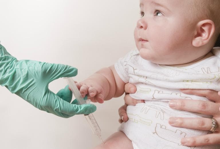 An infant receiving his scheduled vaccination. (Amanda Mills/CDC)