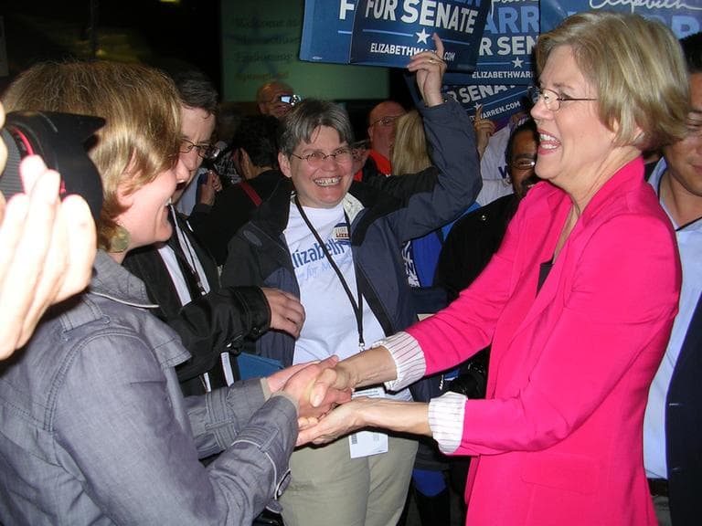 Senate candidate Elizabeth Warren greets supportive delegates after winning almost 96 percent of their votes at the state Democratic Party convention in Springfield. (Lynn Jolicoeur for WBUR)