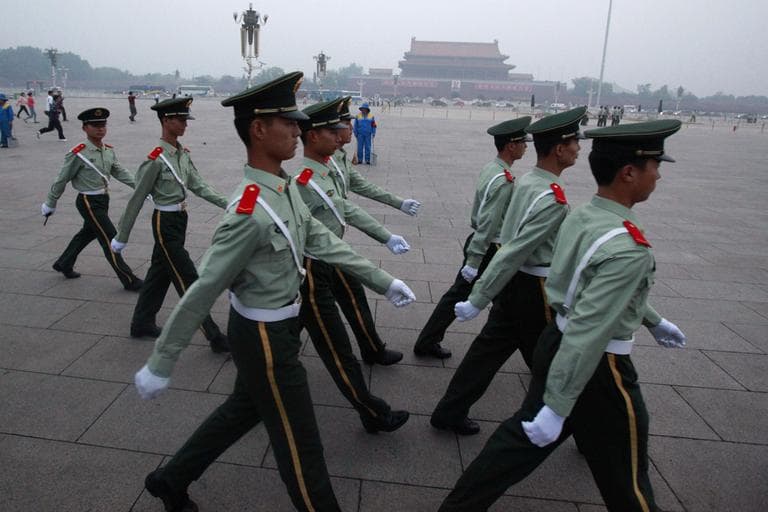 Chinese paramilitary police march on Tiananmen Square after the flag raising ceremony on the June 4 anniversary of the crushing of the 1989 pro-democracy movement centered on the square in Beijing, China. (AP)