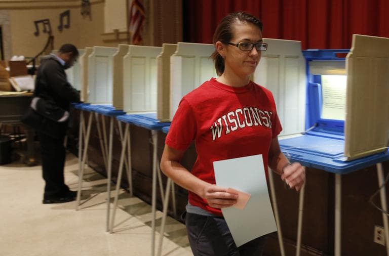 A woman casts her ballot Tuesday in Milwaukee. Wisconsin. (AP)