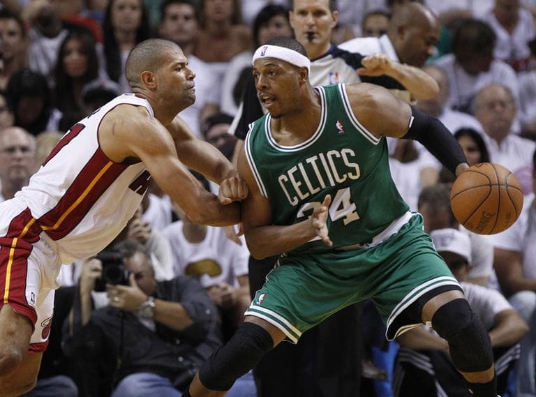 Boston Celtics&#039; Paul Pierce (34) dribbles the ball as Miami Heat&#039;s Shane Battier (31) defends during the first half of Game 5 in their NBA basketball Eastern Conference finals playoffs series. (AP)