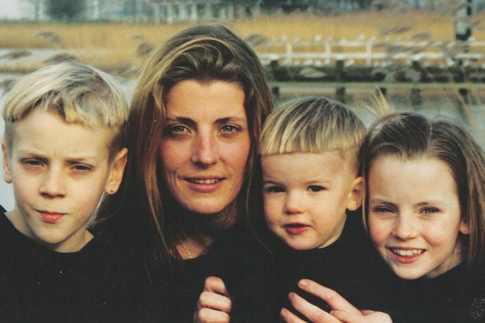 Holly Collins and three of her children. (Courtesy No Way Out But One)