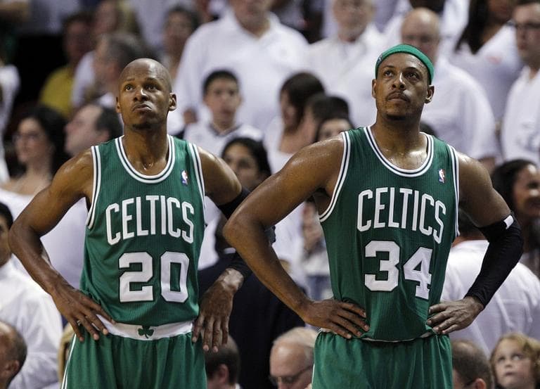 Boston Celtics&#039; Ray Allen (20) and Paul Pierce (34) look up at the scoreboard as the Celtics fall behind the Miami Heat during the second half of Game 7 of the NBA basketball playoffs Eastern Conference finals, Saturday, June 9, 2012, in Miami. Miami won 101-88. (AP).