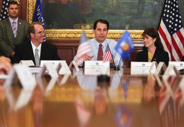 Wisconsin Gov. Scott Walker, center, holds his first cabinet meeting at the state Capitol Wednesday, June 6 in Madison, Wis., after Walker beat Milwaukee Mayor Tom Barrett in a recall election. (AP)