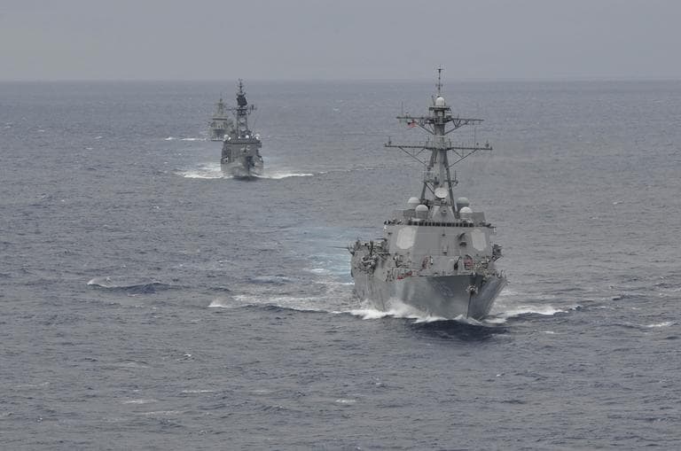 The Arleigh Burke-class guided-missile destroyer USS McCampbell (DDG 85), front, leads a formation during joint military operations as part of Pacific Bond 2012. Pacific Bond 2012 is a U.S. Navy, Royal Australian Navy, and Japan Maritime Self Defense Force maritime exercise designed to improve interoperability and further relations between the nations. (U.S. Navy)