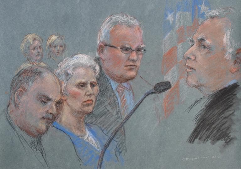 U.S. District Judge Douglas Woodlock, right, sentences Catherine Greig, center, to eight years in prison for helping James &quot;Whitey&quot; Bulger stay on the run. (Margaret Small for WBUR)