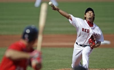 Boston Red Sox starter Daisuke Matsuzaka delivers to Washington Nationals' Ryan Zimmerman during the first inning of a baseball game at Fenway Park, Saturday, June 9, 2012, in Boston. Matsusazka, who underwent Tommy John surgery a year ago, made his first start of the year in the majors. (AP)