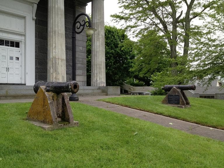 Defensive cannons from the War of 1812 in front of the Barnstable County Courthouse (Adam Raguesa/WBUR)