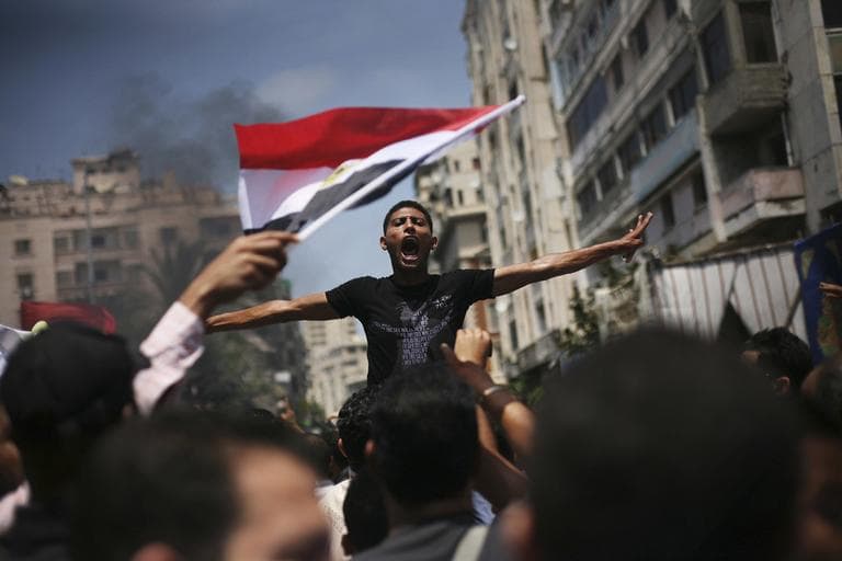 An Egyptian protester chants slogans against presidential candidate Ahmed Safiq during a demonstration against the Supreme Constitutional Court rulings in Alexandria, Egypt, June 15, 2012. Judges appointed by Hosni Mubarak dissolved the Islamist-dominated parliament Thursday and ruled his former prime minister eligible for the presidential runoff election this weekend, setting the stage for the military and remnants of the old regime to stay in power. (AP)