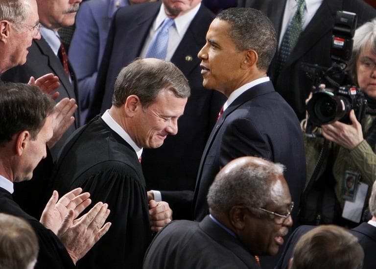 President Barack Obama greets Supreme Court Chief Justice John Roberts before he delivers the State of the Union Address at the U.S. Capitol in 2010. (AP Photo/Charles Dharapak)