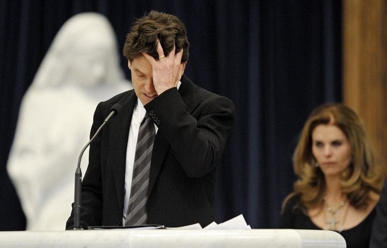 Mark Shriver holds his head as he talks about his father, R. Sargent Shriver, during his funeral outside Washington, D.C. in 2011. (AP/Cliff Owen/Pool)