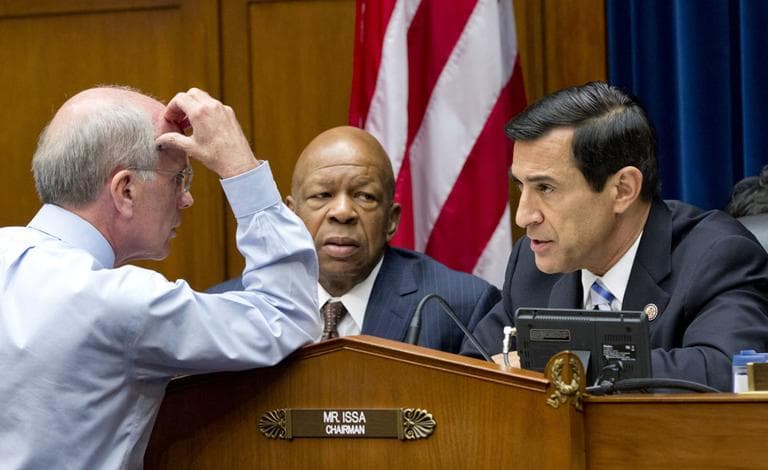 Members of the House Oversight and Government Reform Committee including Rep. Peter Welch, D-Vt., left, confers with Rep. Elijah Cummings, D-Md., center, the ranking member, and Chairman Rep. Darrell Issa, R-Calif., right, on Capitol Hill in Washington, Wednesday. (AP)
