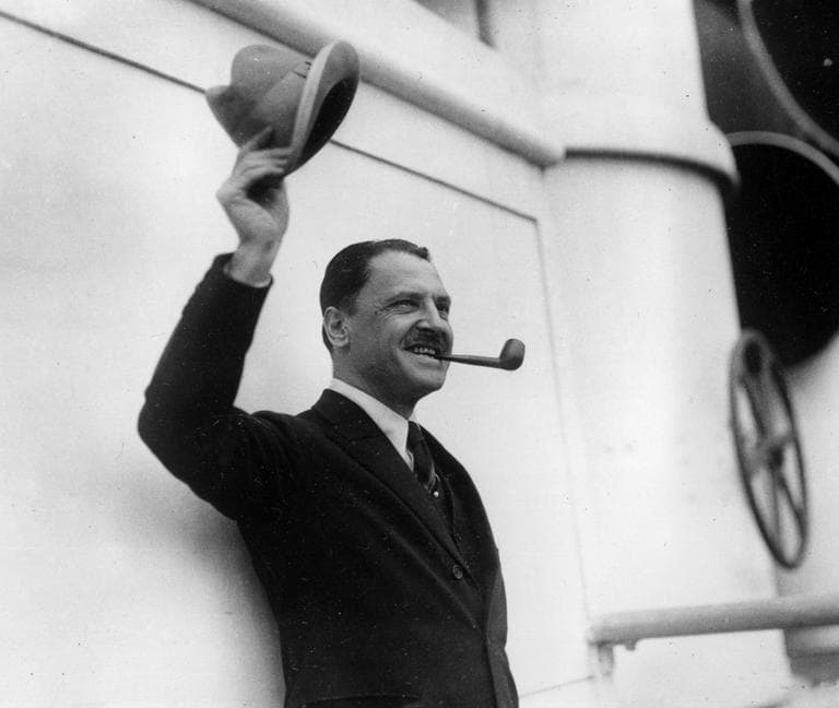 British novelist and playwright W. Somerset Maugham waves farewell as he leaves from New York for Europe aboard the ocean liner Aquitania, on May 22, 1923. (AP)