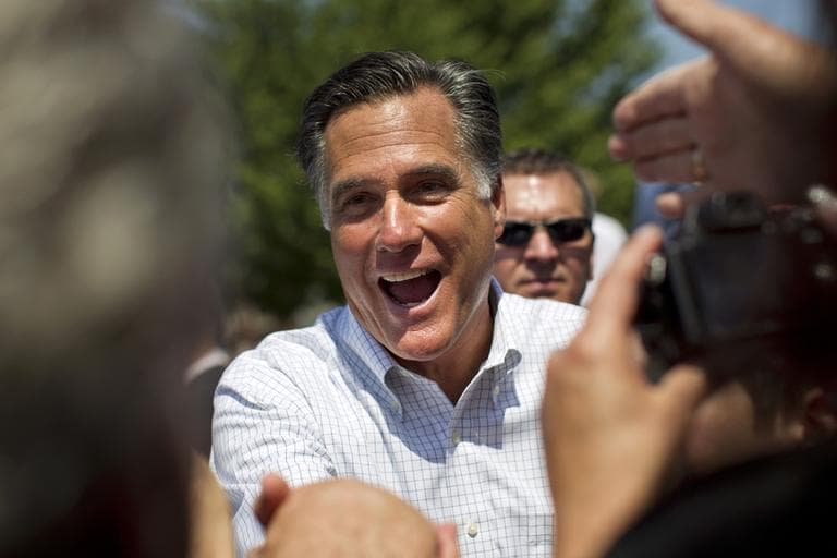In this June 8, 2012, photo, supporters of Republican presidential candidate, former Massachusetts Gov. Mitt Romney reaches out to shake his hand during a campaign stop in Council Bluffs, Iowa. Republican groups are heavily outspending their cross-party counterparts on television advertising in the early stages of the fall campaigns for the White House and control of the Senate, tempering President Barack Obama's financial advantage over Romney and sparking blunt expressions of concern from leading congressional Democrats. (AP)