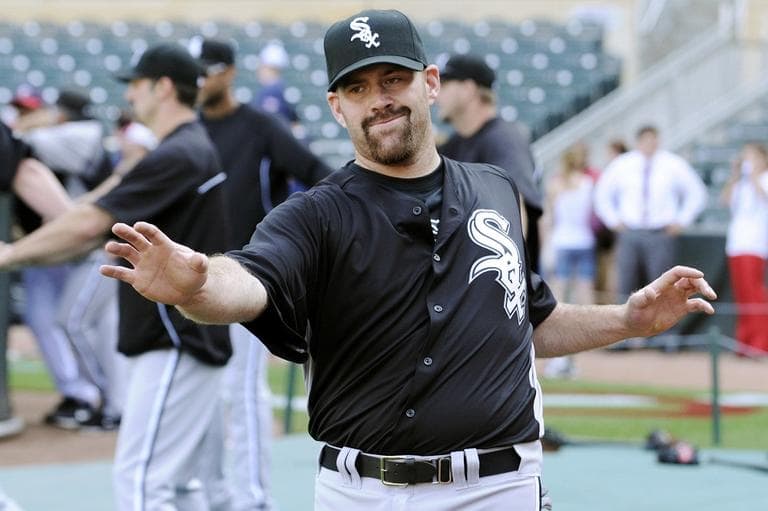 New Chicago White Sox third baseman Kevin Youkilis stretches during warmups prior to a baseball game against the Minnesota Twins, Monday, June 25, 2012, in Minneapolis. Youkilis was traded to the White Sox on Sunday from the Boston Red Sox. (AP)