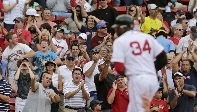 Fans cheer as Red Sox designated hitter David Ortiz rounds the bases with a solo home runat Fenway Park on Wednesday. (AP Photo/Charles Krupa)