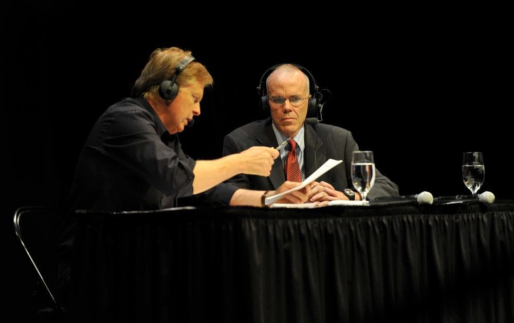 Tom Ashbrook interviews environmental activist Bill McKibben at On Point Live at the Paramount Center in Boston, Mass. on June 14, 2012. (Alex Kingsbury/WBUR)