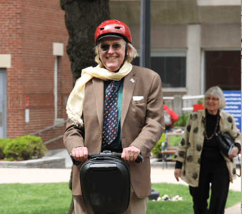 Dr. William Bicknell on his Segway after his May 2 lecture (photo: Michael Saunders, BUSPH)
