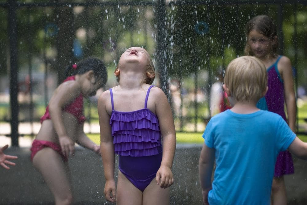 Children flocked to the Boston Common today in order to cool off. (Josh Berlinger/WBUR)