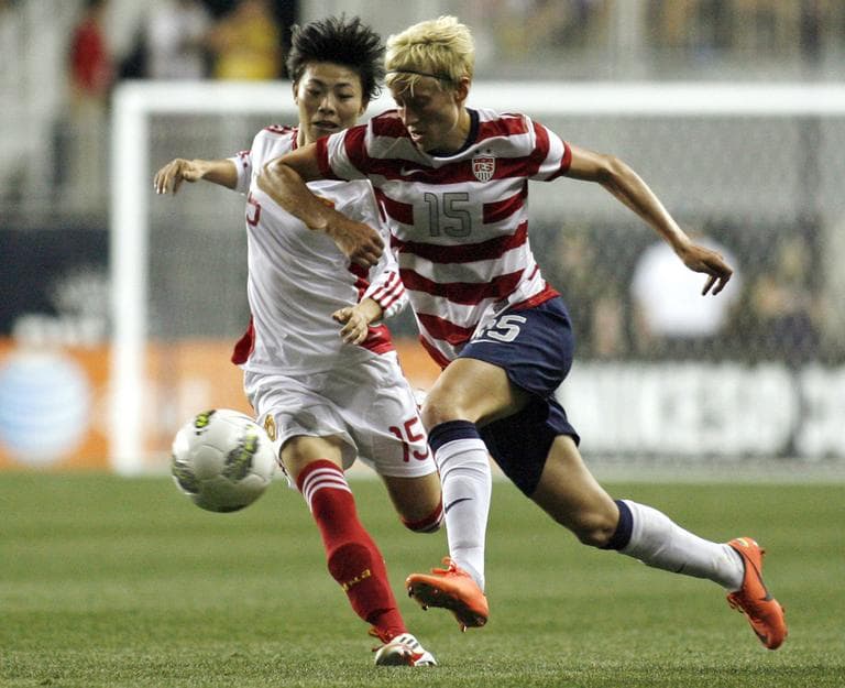 U.S. soccer player Megan Rapinoe (15), show here in a friendly match against China in May, recently revealed she is gay. (AP)