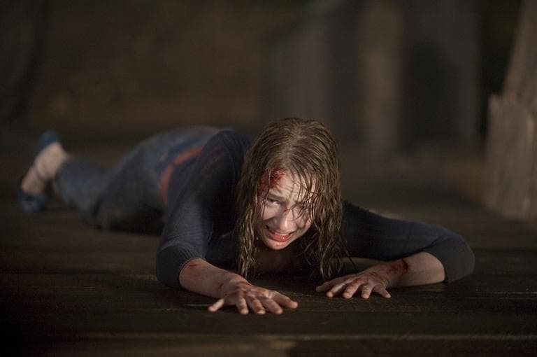 In this film image released by Lionsgate, Kristen Connolly is shown in a scene from "The Cabin in the Woods." (AP)