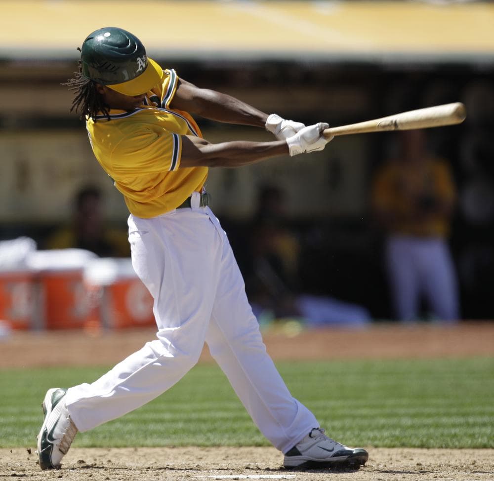 This swing resulted in an RBI for Oakland's Jemile Weeks on July 4, but the A's are struggling again, nearly 23 years since their last World Series title. (AP)
