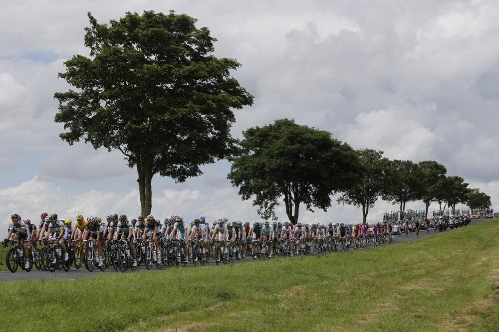 The pack rides during the sixth stage of the Tour de France...one day after the six women of the Reve Tour conquered the same stretch. (AP)