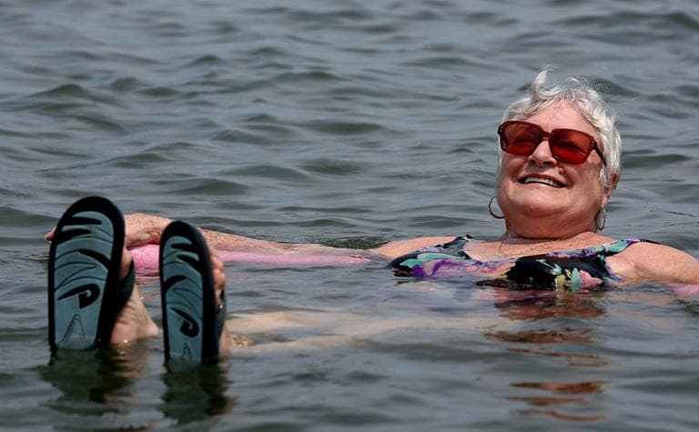 Lillian Mariscalo of Oyster Bay, N.Y. cools off in the waters of an Oyster Bay beach on Long Island's North shore on Saturday. (Craig Ruttle/AP)