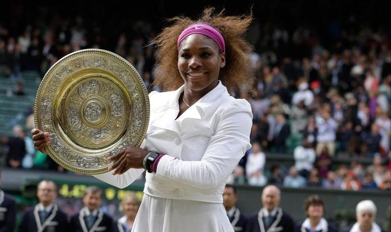 Serena Williams of the United States beat Agnieszka Radwanska of Poland during the women's final match at the All England Lawn Tennis Championships at Wimbledon, England. (Kirsty Wigglesworth/AP)