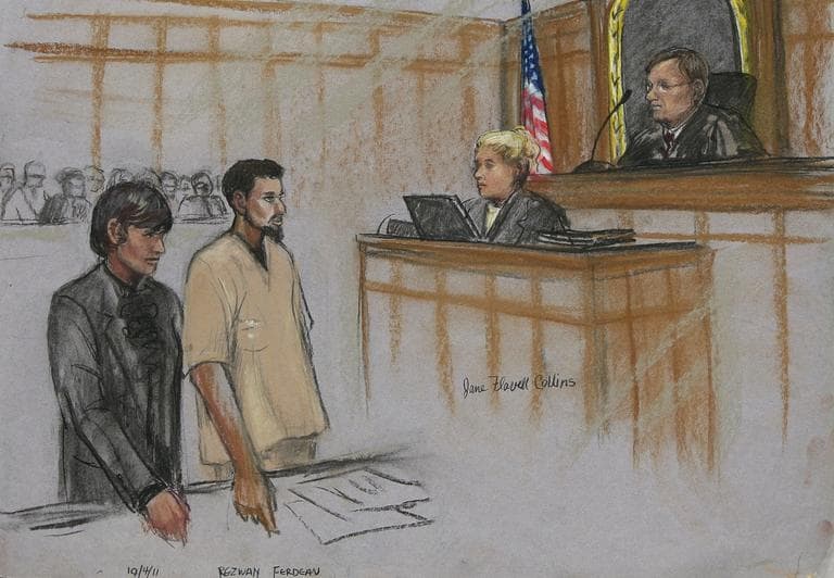In this courtroom sketch, Rezwan Ferdaus, second left, and his attorney Catherine Byrne, left, stand during Ferdaus' arraignment hearing in federal court in Worcester, Mass. Monday afternoon, Oct. 3, 2011. (AP)