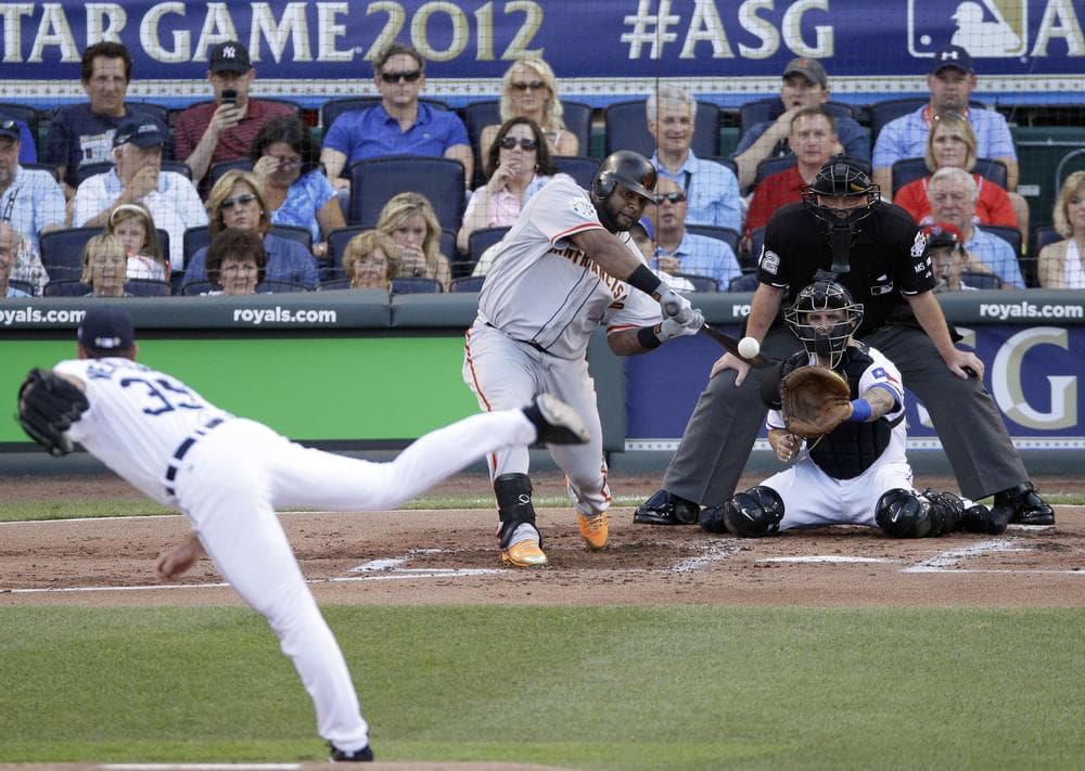 National League's Pablo Sandoval, of the San Francisco Giants, hits a three-run triple on a pitch by American League's Justin Verlander, of the Detroit Tigers, in the first inning of the All-Star game. (AP)