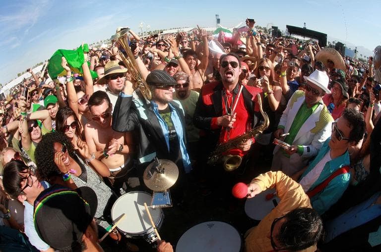 Ozomatli performs from the fan's viewing area during their set at Coachella Valley Music and Arts Festival, Friday, April 15 2011, in Indio, Calif. (AP)