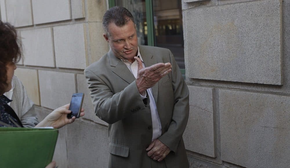 John O'Brien, former Massachusetts probation department commissioner, stands outside a Federal Courthouse in 2012 (AP/Stephan Savoia).