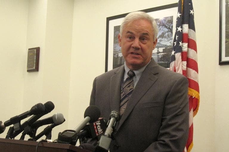 Highway Administrator Frank DePaola answers questions during a press conference about a light fixture that fell onto the roadway of Route 1 in Charlestown, on the ramp leading to the Tobin Bridge. (Kathleen McNerney/WBUR)