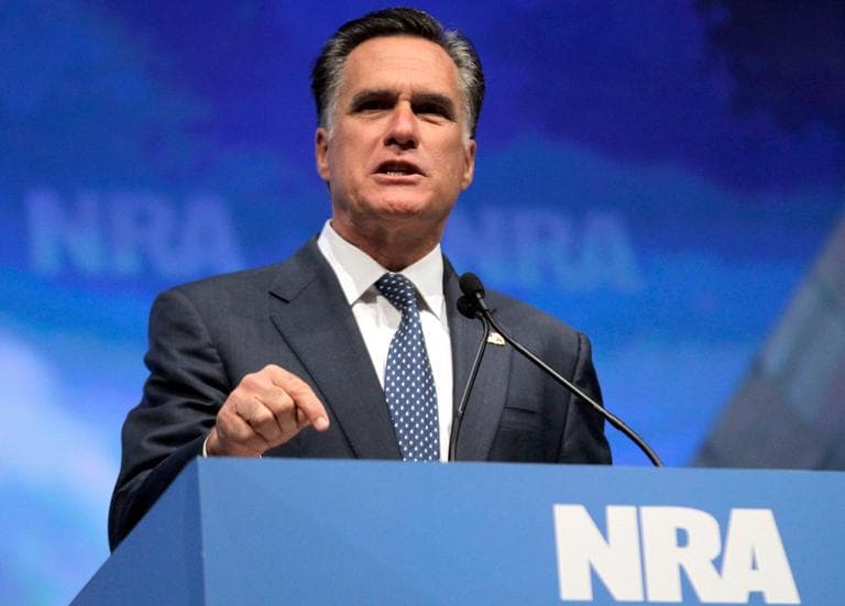 Mitt Romney speaks at the National Rifle Association convention in St. Louis on April 13. (AP)