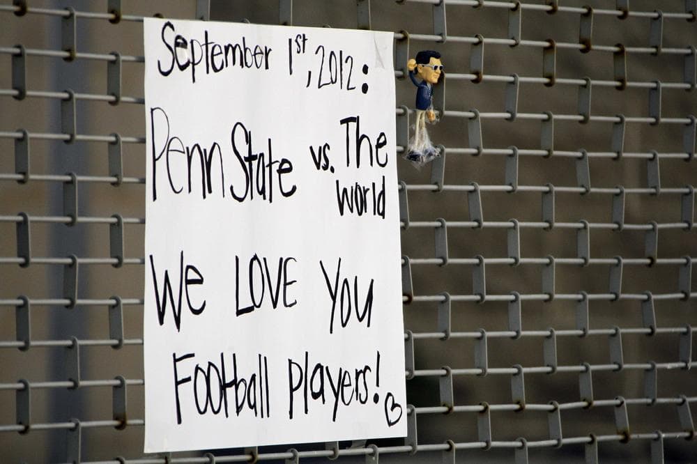 The NCAA's penalties against the Penn State football have sparked debates about fairness. Someone hung this sign outside Beaver Stadium on the PSU campus Monday. (AP)