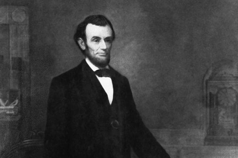 President Abraham Lincoln is shown in a formal portrait, holding the 13th Amendment of the Constitution, year unknown. (AP)