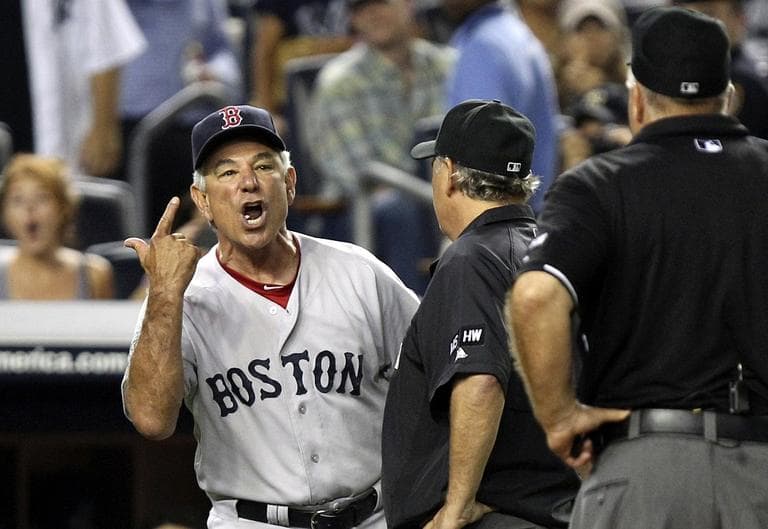 Red Sox manager Bobby Valentine, left, argues with umpire Brian O&#039;Nora, right, after being thrown out of the game for arguing a call during the 10th inning. (AP Photo/Seth Wenig)