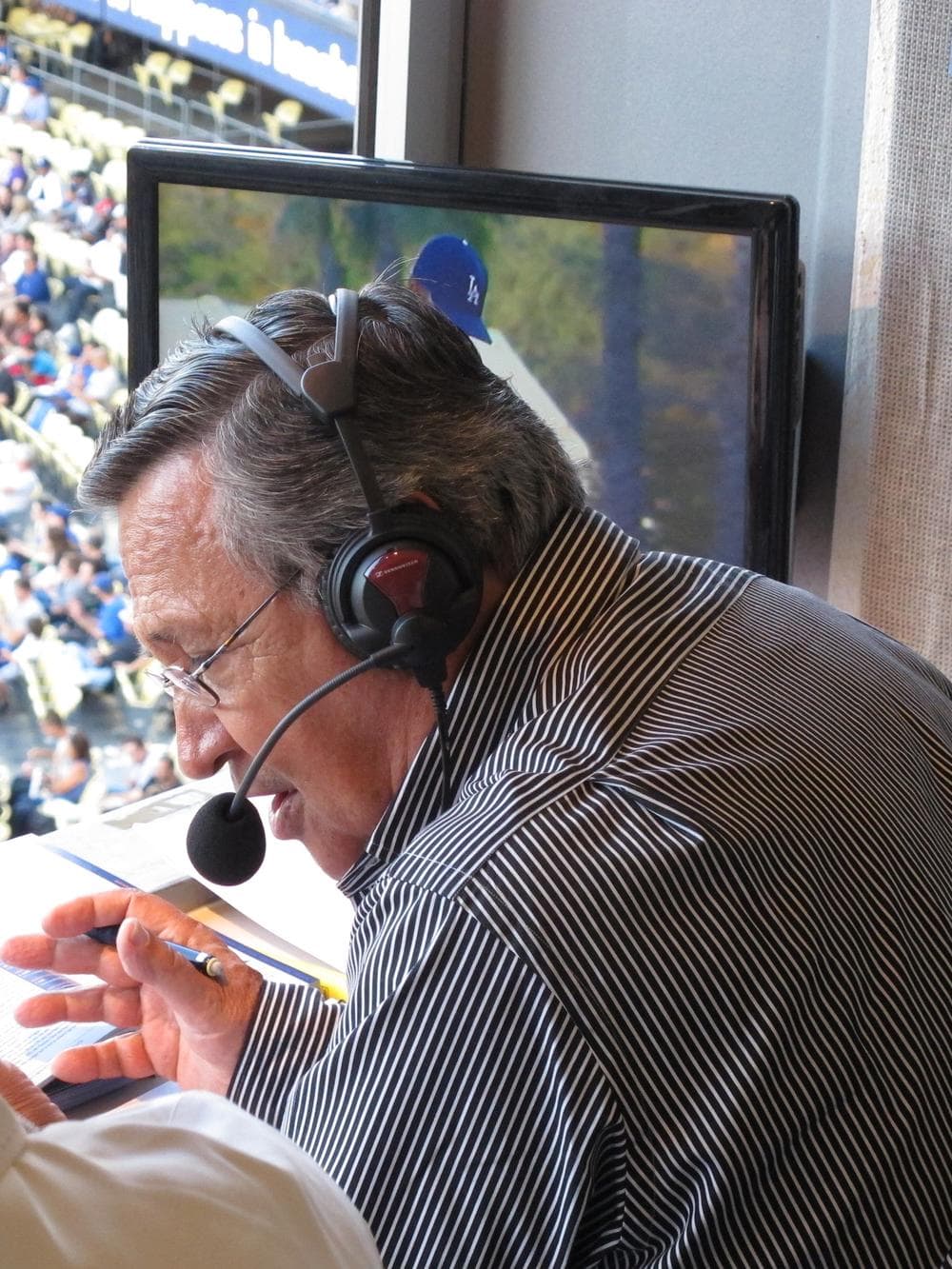 Jaime Jarrin announces an L.A. Dodger game for Spanish-language radio.  (Susan Valot/Only A Game)