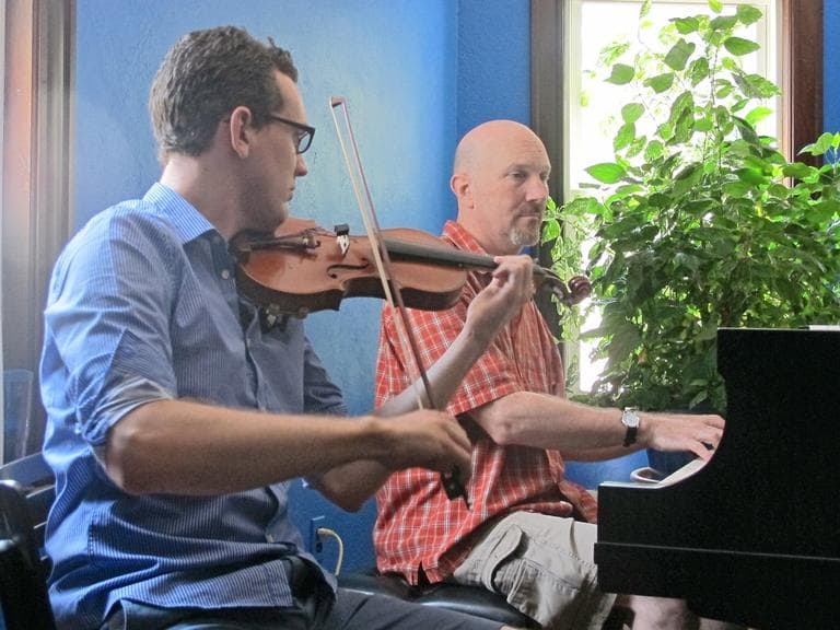 Ben Powell on violin and Tim Ryan on piano. (Andrea Shea/WBUR)