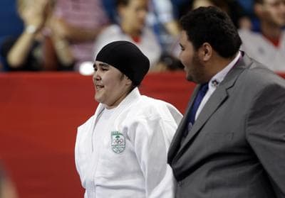 Judo competitior Wojdan Shaherkani is one of Saudi Arabia's first two female Olympic participants, a feat in a women's athletic world that is still taking steps forward. (AP)