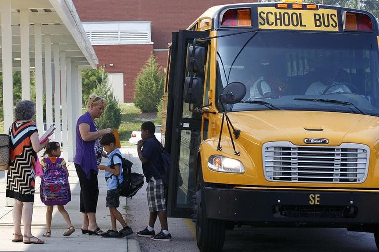 Students return for their first day of classes at Barwell Road Elementary School in Raleigh, N.C., Monday, July 9, 2012. (AP)