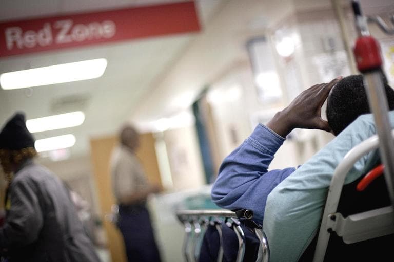  a patient waits in the halls of the trauma unit of the emergency room at Grady Hospital in Atlanta. (AP)