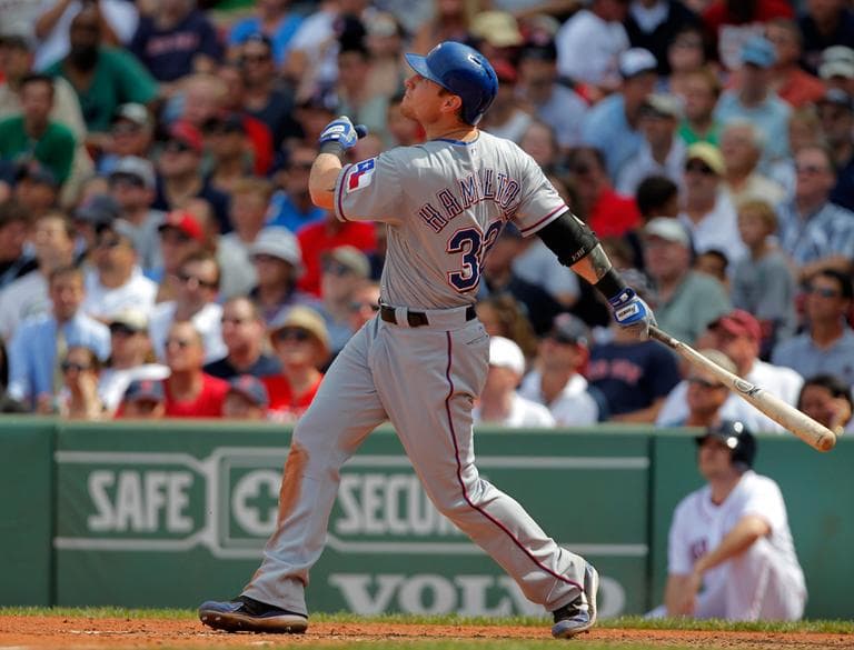 Texas Rangers&#039; Josh Hamilton hits a two-run home run off a pitch by Red Sox starter Josh Beckett in the fifth inning Wednesday. (AP)