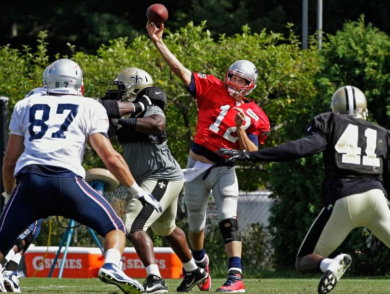 Patriots quarterback Tom Brady throws a pass to tight end Rob Gronkowski (87) against the New Orleans Saints during a joint practice on Tuesday at Gillette Stadium. (AP)