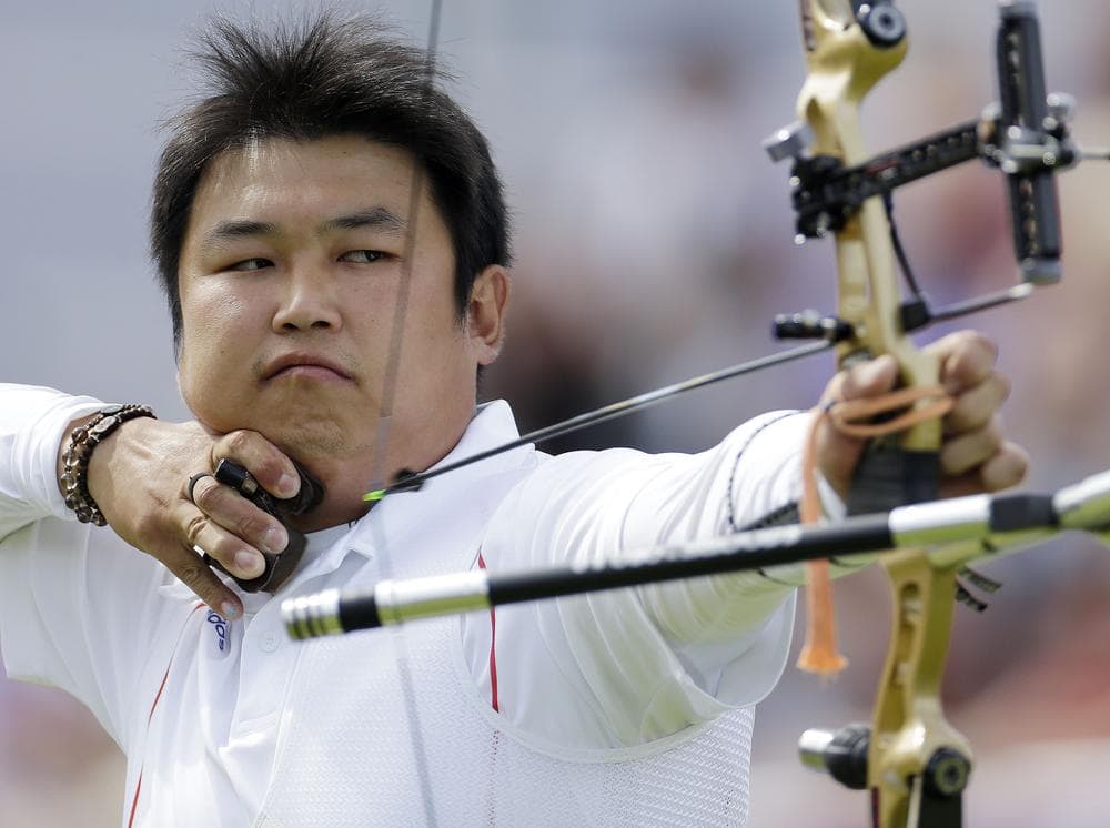 South Korea's Oh Jin-hyek shoots for a gold in the men's individual archery competition in London. (AP)
